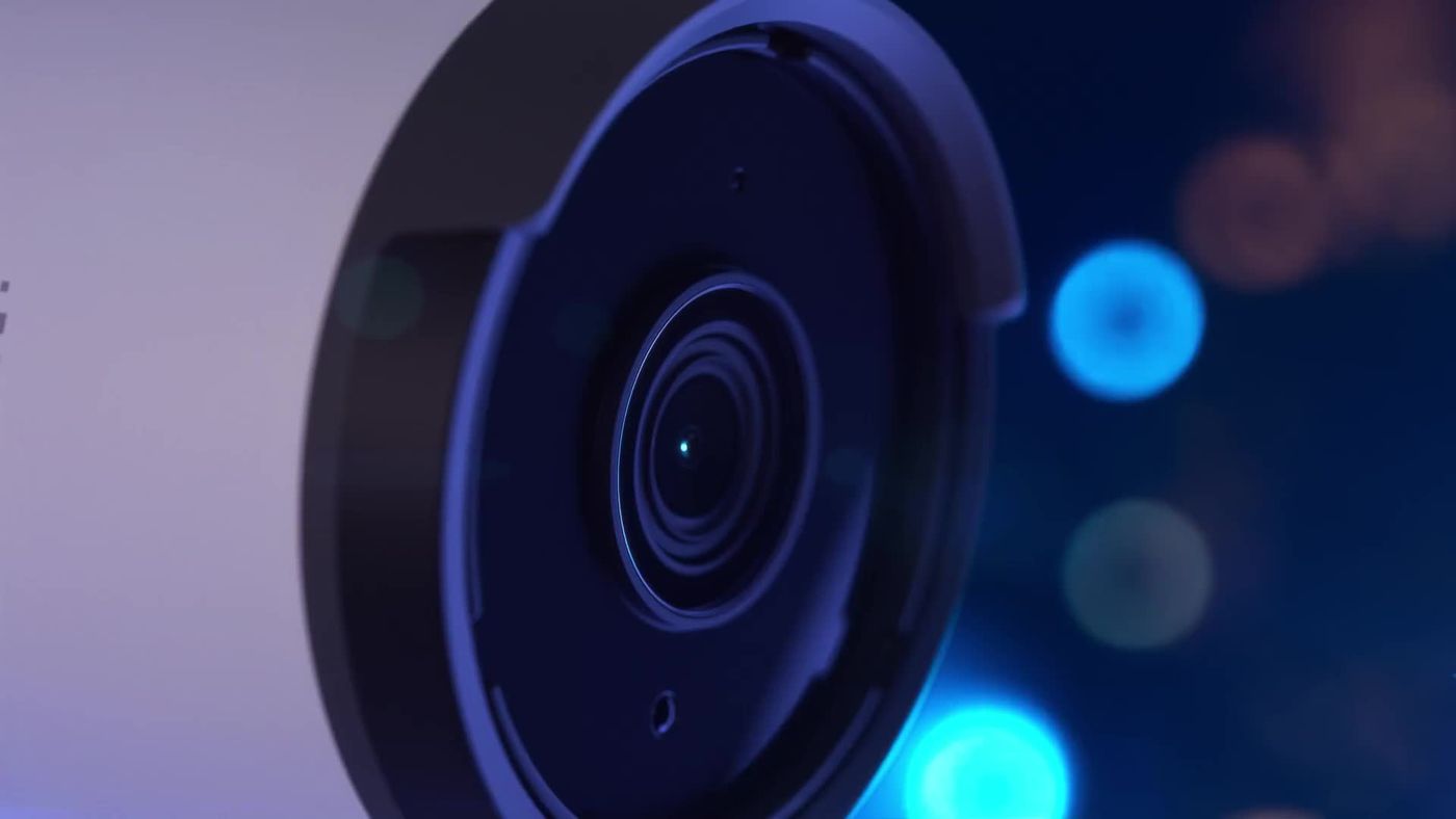 UniFi Protect camera lens close-up with blue bokeh